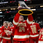 Denver Pioneers winning the 2026 NCAA Men’s Frozen Four championship trophy