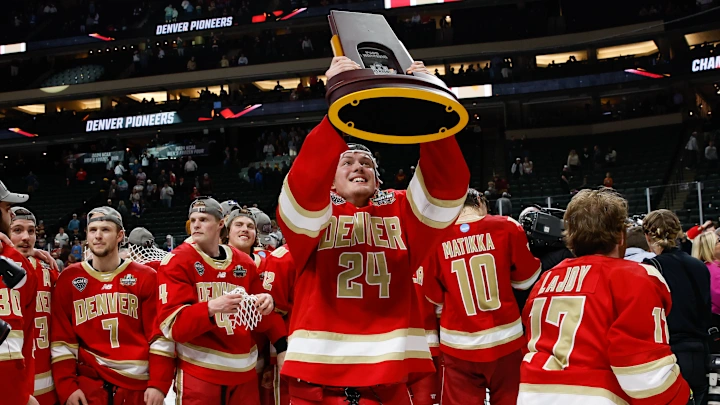 Denver Pioneers winning the 2026 NCAA Men’s Frozen Four championship trophy